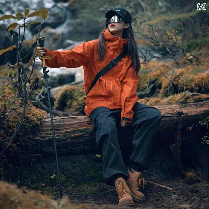 アウター パーカー アウトドア 2025年の新作女性向けオレンジ色のフードつきジャケット。アウトドア用に耐風仕様で、アメリカンスタイルの機能性が備わった男性向け冲锋衣。