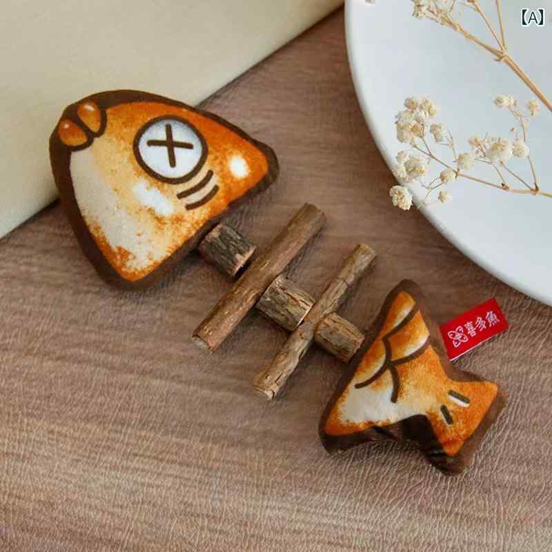 猫用 おもちゃ 猫の 木製の 天 寮の 魚の 骨の おもちゃ 臼歯の 歯の 掃除 歯を 噛んで 気分を リラッ..