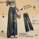 ラシャベルのセメントグレーのハイウエスト、フェイクダメージ、ワイドレッグデニムパンツ。春の新作で、ゆったりとしたシルエットでスタイルアップし、足長効果も抜群のロ...