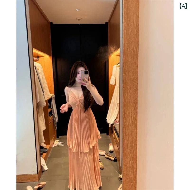 レディース ドレス おしゃれ 新しい夏の雰囲気を持つ、雪桃色の、法国風でセクシーでエレガントな、プリーツ入りのドレスを身につける女性