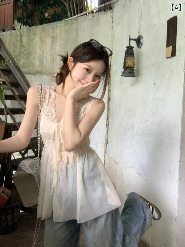 レース　キャミソール　トップス レースの インナーウェア ウエストを 締める タイ バックの アウターウェアを 備えた 海辺での 休暇に 最適な 夏用の フランス製 メッシュ キャミソール ベスト。