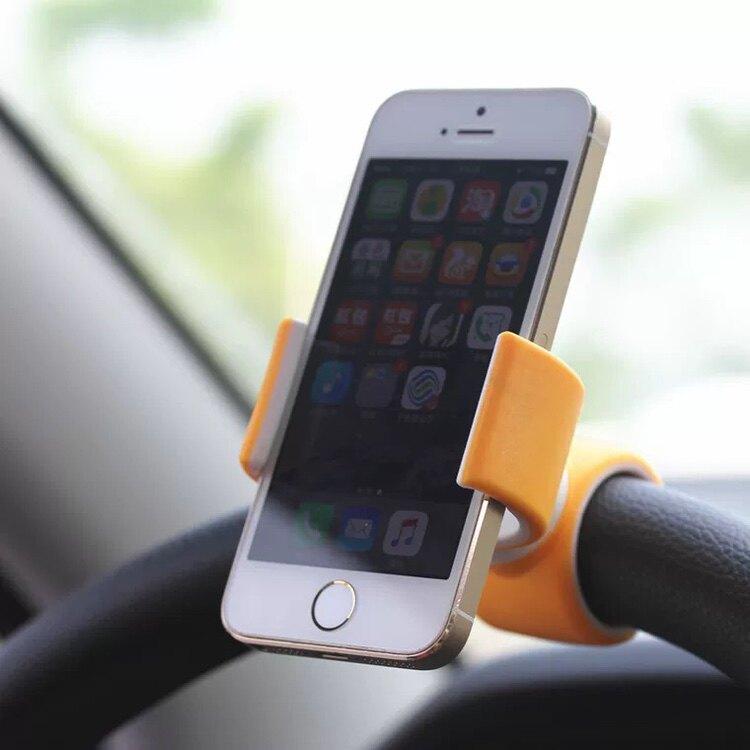 スマホホルダー 車載用 ステアリングホイール固定 クリップ式 汎用 多機能 自動車ナビ対応 運転中便利 簡単取り付け 調整可能 安全運転サポート・スタイル: 現代.クール.・取り付け方法: クリップ式・カラー: イエロー.ブラック・適用部位: 方向盤