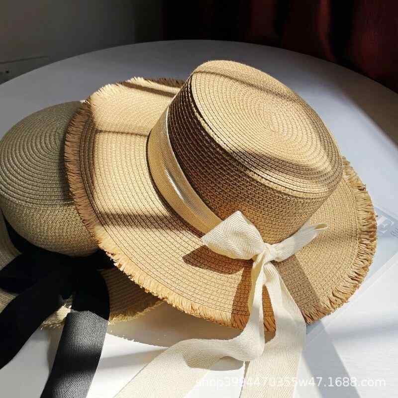 麦わら帽子 レディース 夏用 平頂 蝶結 リボン ビーチ 遮陽 フリンジ ラフィア 軽量 通気性 日系 かわいい ナチュラル 素材 UVカット 調整可能