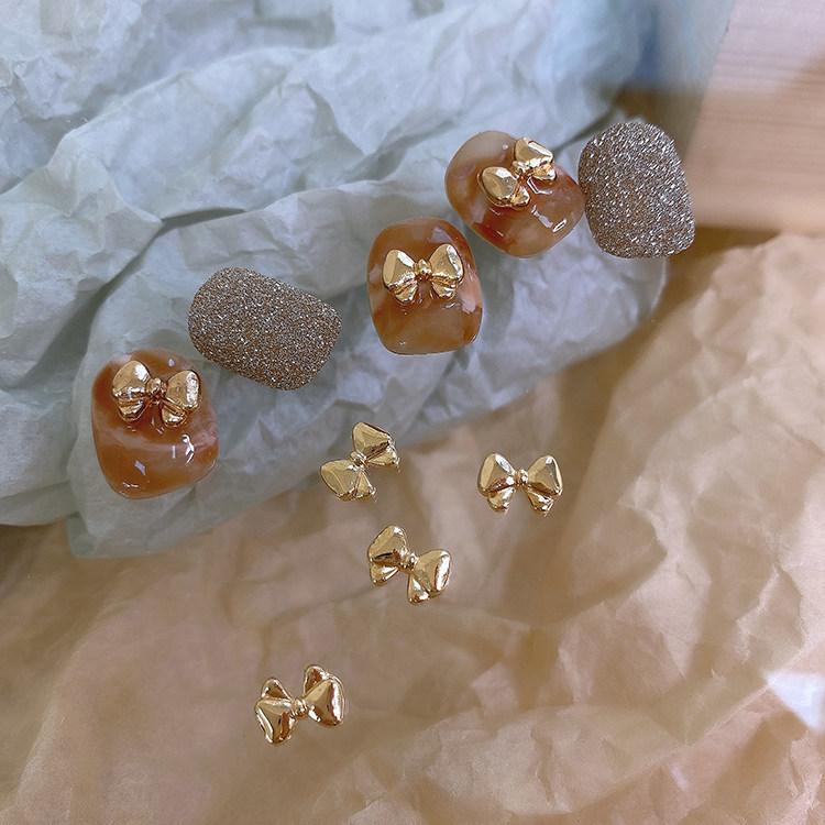 ネイルチャーム かわいい ゴールド 蝶結び ミニ 金属パーツ クリスマス 飾り ウィンター アクセサリー ネイルアート 用 輝き 装飾