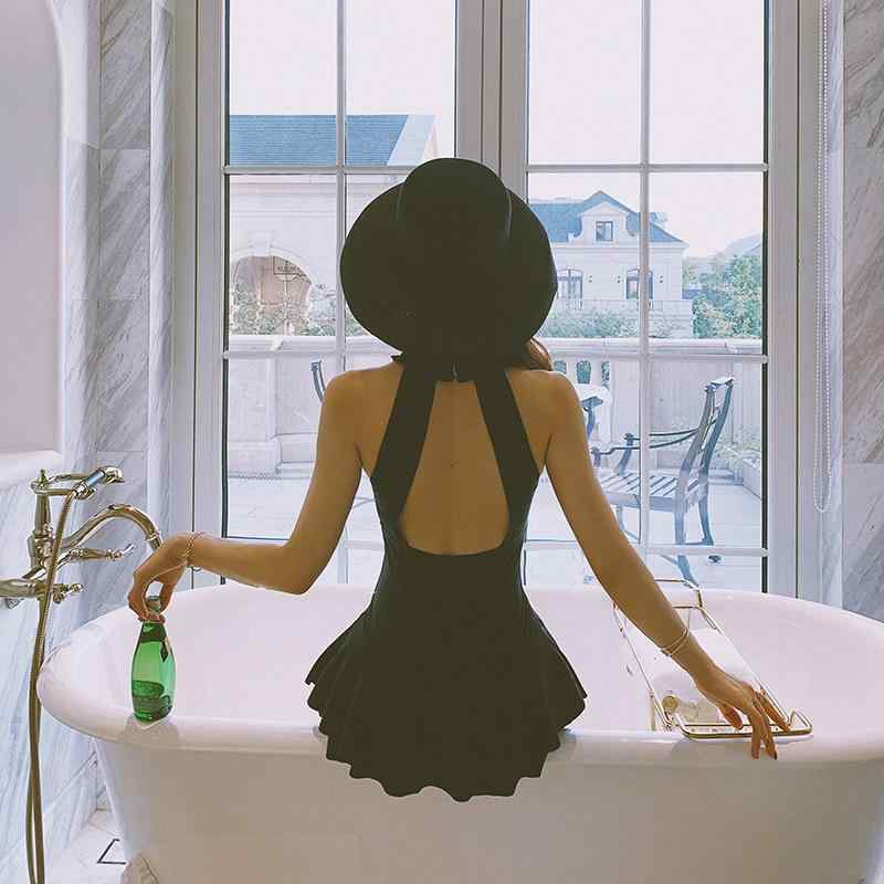 ワンピース水着 レディース スカート付き 背中開き 小胸対応 スリム効果 控えめ 夏用 温泉対応 プール用 吸湿速乾 軽量素材 高級感 ブラック ピンク系