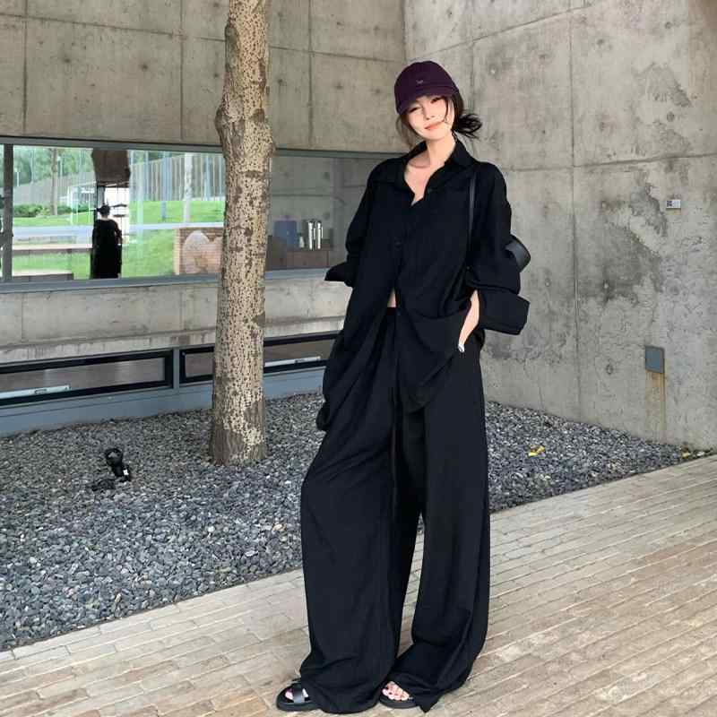 レディース 夏 リネン シャツ ワイドレッグパンツ セット ブラック 高級感 ゆったりシルエット カジュアル 日常使い 通気性 軽量 フィット・パンツ丈: ロング・主な素材: ポリエステル100%・セット内容: 2点セット・袖丈: 長袖・着用方法: ボタン・サイズ展開: S.M.L.XL・カラー展開: 黒シャツ+黒ワイドパンツ.青シャツ+青ワイドパンツ.白シャツ+白ワイドパンツ・対象年齢: 18-25歳