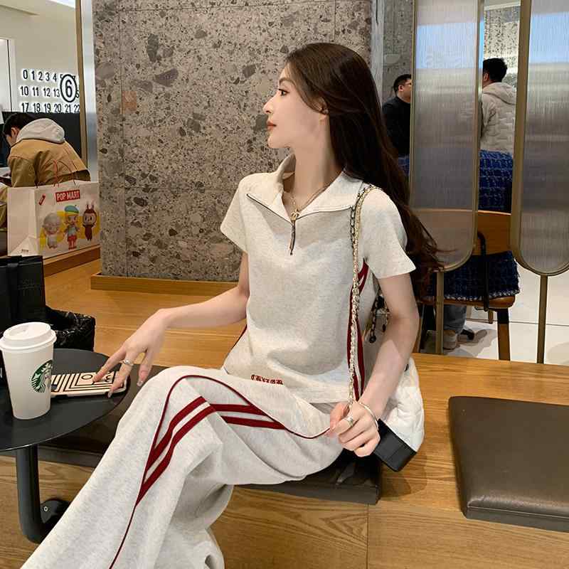 レディース 夏 韓国 スリム 短袖 トップス ワイドパンツ セットアップ 運動 カジュアル コーディネート ゆったり シルエット 軽量 吸湿速乾・対象年齢: 25-35歳・組み合わせ: 2点セット・パンツ丈: ロング・袖丈: 半袖・襟型: ・着用法: プルオーバー・サイズ展開: S.M.L.XL・カラー: グレー