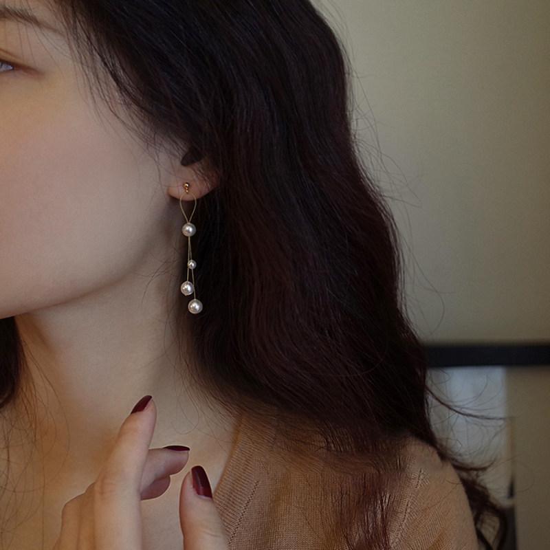 Ruby - レディース イヤリング パール フリンジ タッセル 揺れる 高級感 軽やか ファッション アクセサリー 華奢 スタイル 日常使い ユニーク