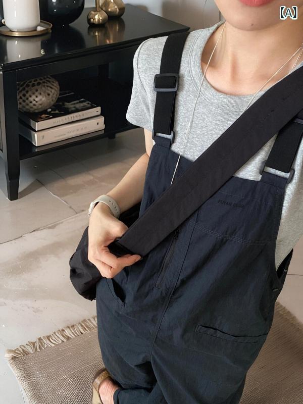 つなぎパンツ レディース 黒 ワークスタイル レトロ 小柄対応 スリムシルエット カジュアル ストレート 軽量 伸縮性 再生繊維 春秋 普段使い