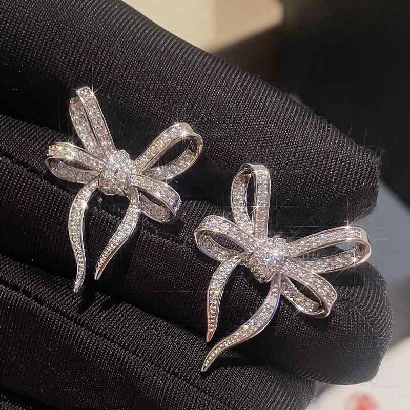 Topaz - イヤリング 女性用 かわいい 蝶結び デザイン キラキラ 輝き 甘め プリンセス スタイル ファッション アクセサリー 華奢 繊細 耳元 装飾 日常使い 軽量 合金 加工 シルバー ピンク ゴールド