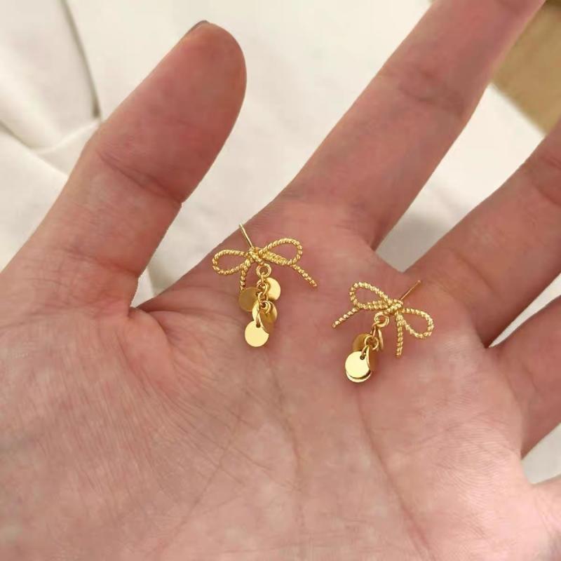 Cubic Zirconia - イヤリング 女性用 蝶結び キラキラ ファッション 耳飾り 精致 気質 軽量 個性 デザイン かわいい アクセサリー ゴールド シルバー 日常使い シンプル 華やか