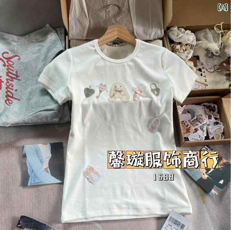 Rakuten - トップス 女性用 短袖 Tシャツ 丸首 かわいい プリント バレエ 少女 ウサギ 柄 甘辛ミックス スリムフィット 綿素材 伸縮性 春夏 普段使い カジュアル ブラック ピンク系