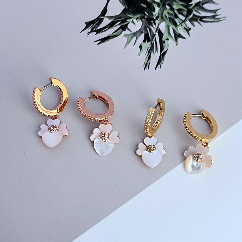 フラワーモチーフ 女性用 ピアス イヤリング かわいい ジルコニア 貝殻 装飾 ファッション アクセサリー 華奢 タイプ ピンク系 カラー 軽量 素材 普段使い 春夏 向け シンプル スタイル