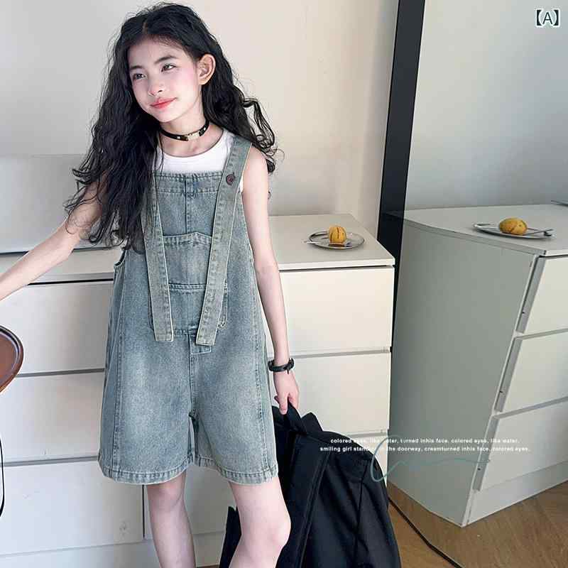Rakuten - 女の子 デニム オーバーオール ショートパンツ 春夏 キッズ ガールズ 韓国 ゆったり ワイドシルエット 中学生 大学生 スタイル 綿素材 伸縮性 吸湿速乾 軽量 通学 普段使い 遊び着 ブルー デニム ビッグシルエット ハイウエスト ポケット