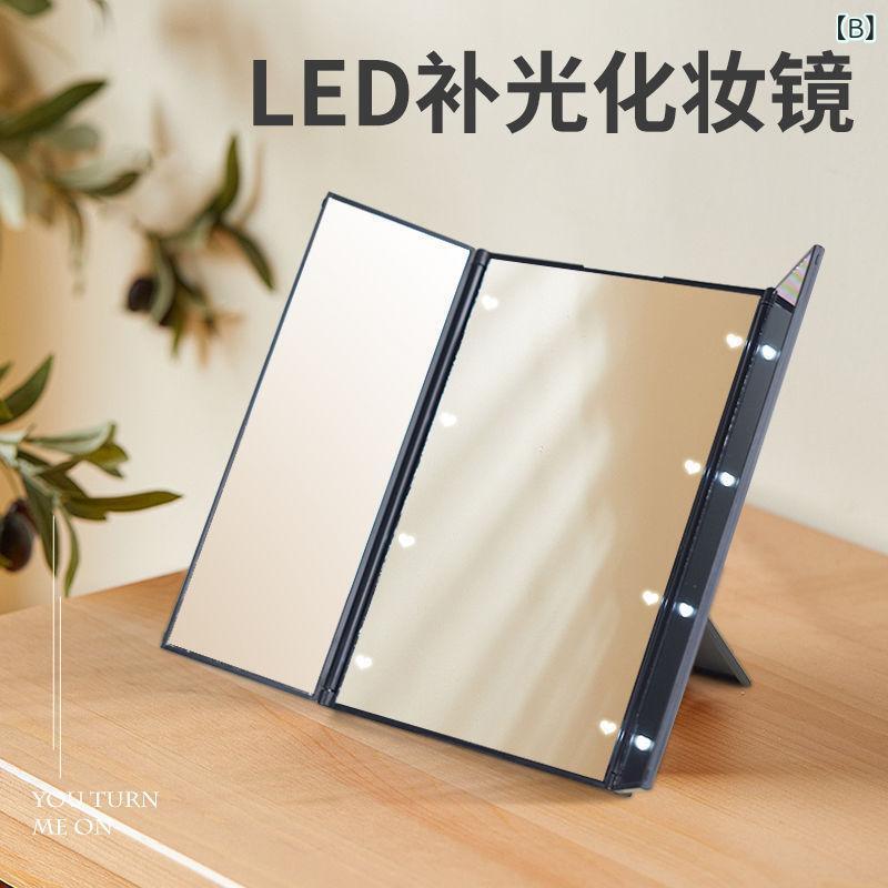 リバーパディの折りたたみ化粧鏡 卓上 コンパクト ポータブル LEDライト 折り目三つ折り メイク用 旅行 持ち運び 軽量 明るい照明 鏡面 スタンド式 女性用 メイクアップ ハンドヘルド 折り畳み 卓上置き ポケットサイズ｜アングル3