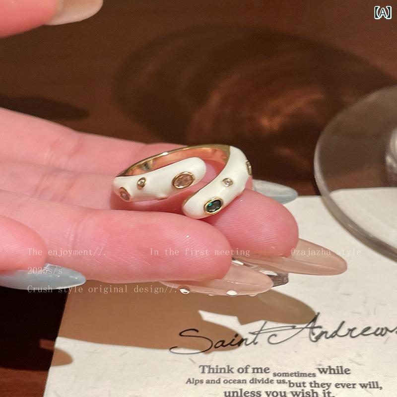 指輪 女性用 ミルキーカラー クロス ジルコニア ライトジュエリー 高級感 食指用 独特 絶美 スタックリング 指輪 かわいい 重ね付け 日常使い 軽量 輝き ピンク系 シルバー調 アクセサリー シンプル 洗練 ギフト向き