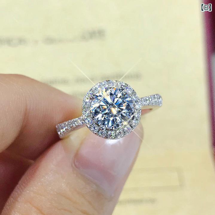 リバーパディの指輪 女性用 1カラット 八心八箭 高炭素ジルコニア シンプル 六爪 婚約指輪 結婚指輪 輝き クリア カット 日常使い フォーマル シルバー ゴールド ピンクゴールド ホワイトゴールド ラウンドシェイプ 耐久性｜アングル3