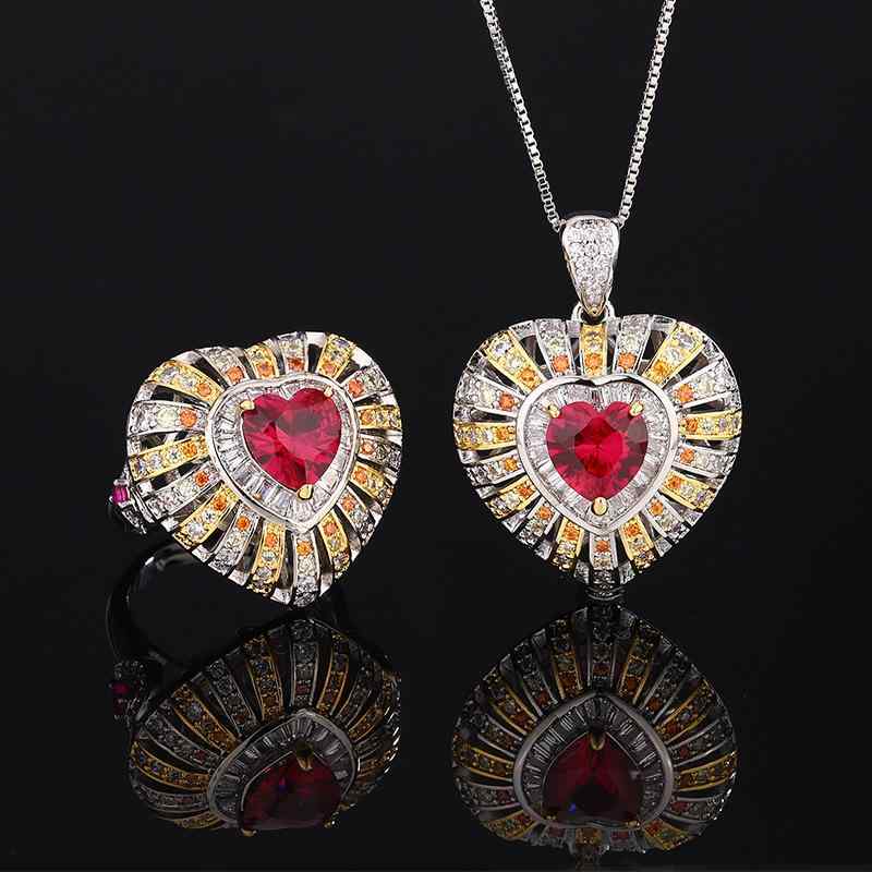 Women's Jewelry Set: Heart-shaped ring and necklace with red synthetic stone. Lightweight, luxurious, and fashionable accessory set. Cute and elegant, perfect for everyday wear and layering. Features pink tones, gold plating, and intricate detailing.