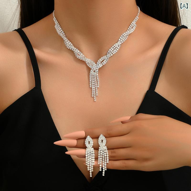 Silver jewelry set for women, perfect for weddings, dresses, and photo shoots. Includes necklace and earrings. Features a glossy, elegant, and simple design with sparkling gold and silver accents. Individually packaged.