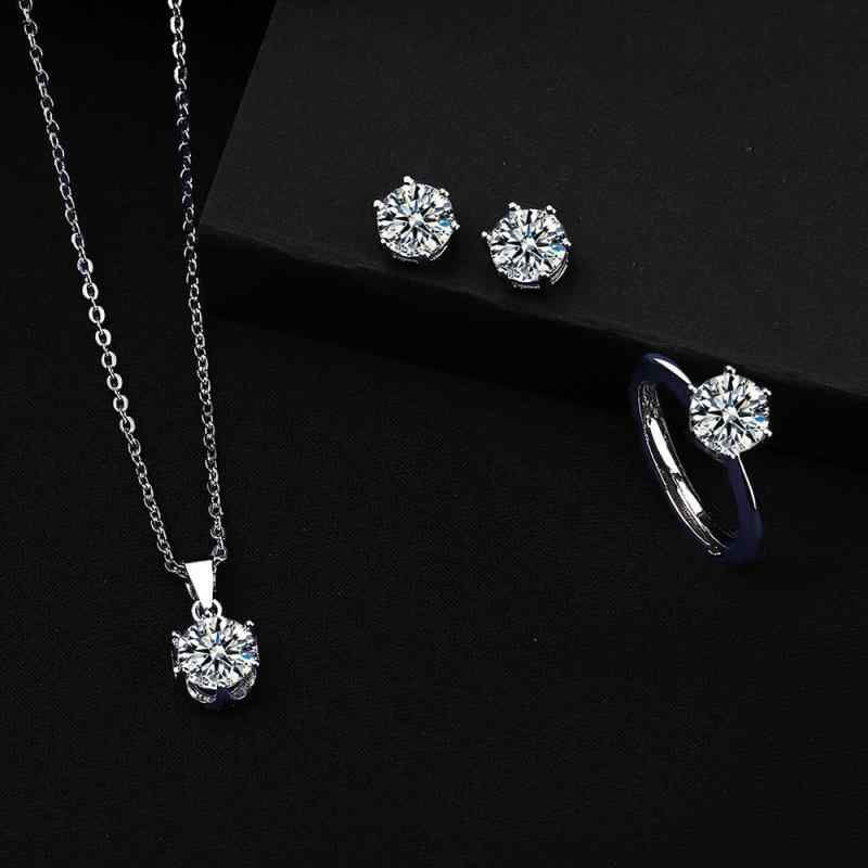 Jewelry Set: Simple and Classic Zirconia Six-Prong Earrings, Necklace, and Ring - 3-Piece Set. A fresh and elegant accessory set that sparkles and shines. Perfect for everyday wear. Features a delicate silver-tone design and stylish details. Ideal as a gift.