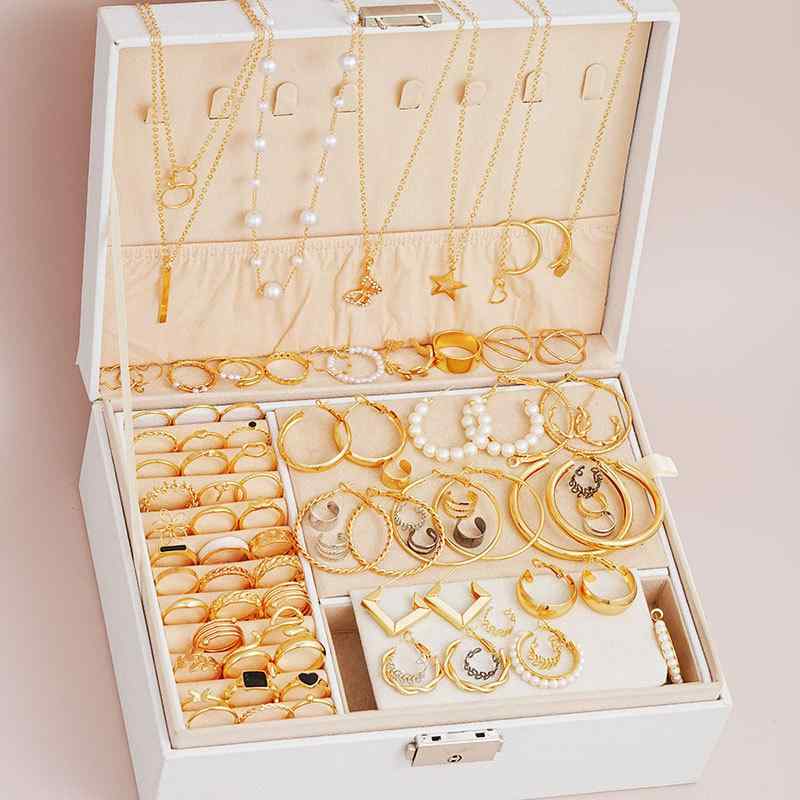 Jewelry Set in Gold: Simple, Modern, Creative, Pearl, Zirconia Ring, Earrings, Necklace. A delicate, sparkling accessory set for women, perfect for everyday wear or as a gift. Lightweight, high-quality, and luxurious.