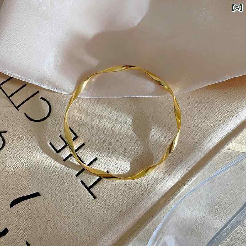 リバーパディの手首アクセサリー 女性用 モビウスリング ブレスレット 不規則波浪 閉口 チタン製 軽量 高級感 光面 シンプル｜アングル2