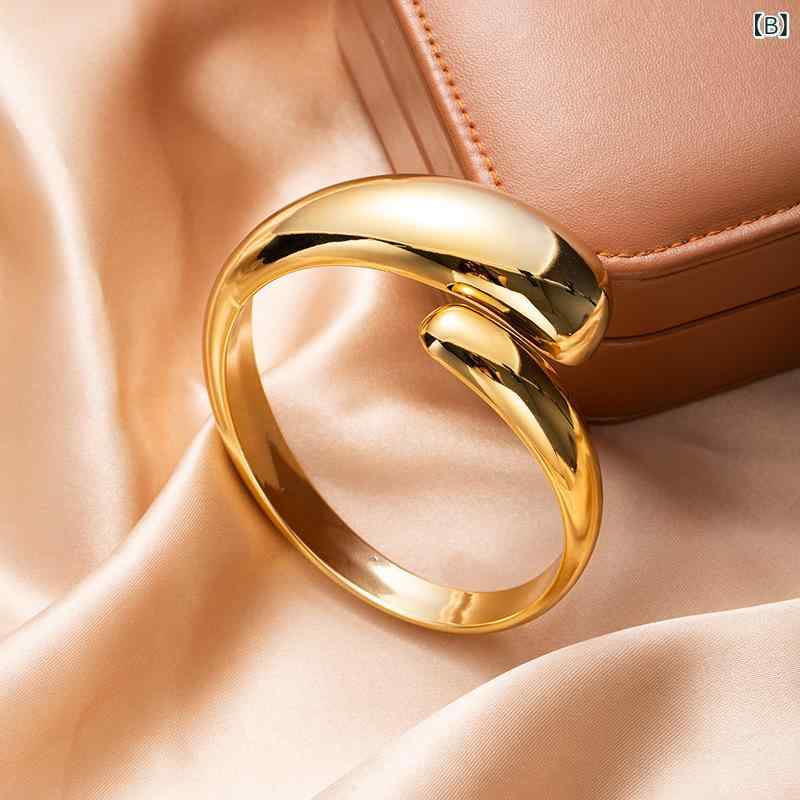 ブレスレット メンズ ウーマンズ 幾何学 楕円形 オープン 手首 アクセサリー シンプル ミニマル ファッション トレンド モダン デザイン 高級感 スタイリッシュ 日常使い 軽量 金属 シルバー ゴールド 調節可能 人気 手元 華やか 洗練 アクセント 3