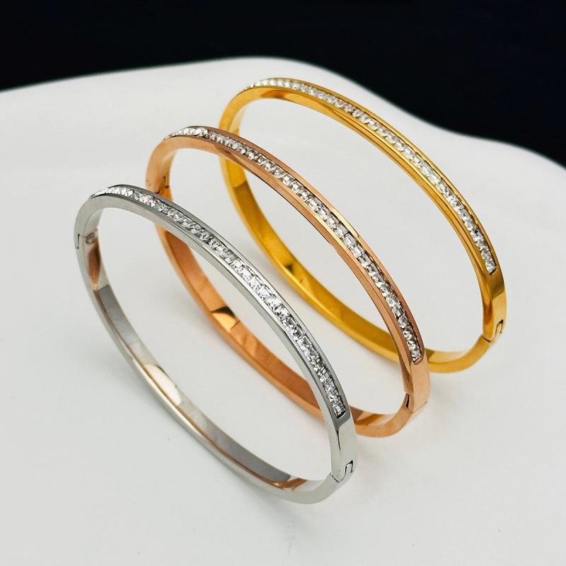 レディース 手首アクセサリー チタン ブレスレット 女性用 高級感 個性派 星モチーフ 色落ちなし ジルコニア インセット 洗練 シンプル インスパイアード フルダイヤ 手環 軽量 耐久性 輝き 日常使い シルバー系 アクセント ジュエリー