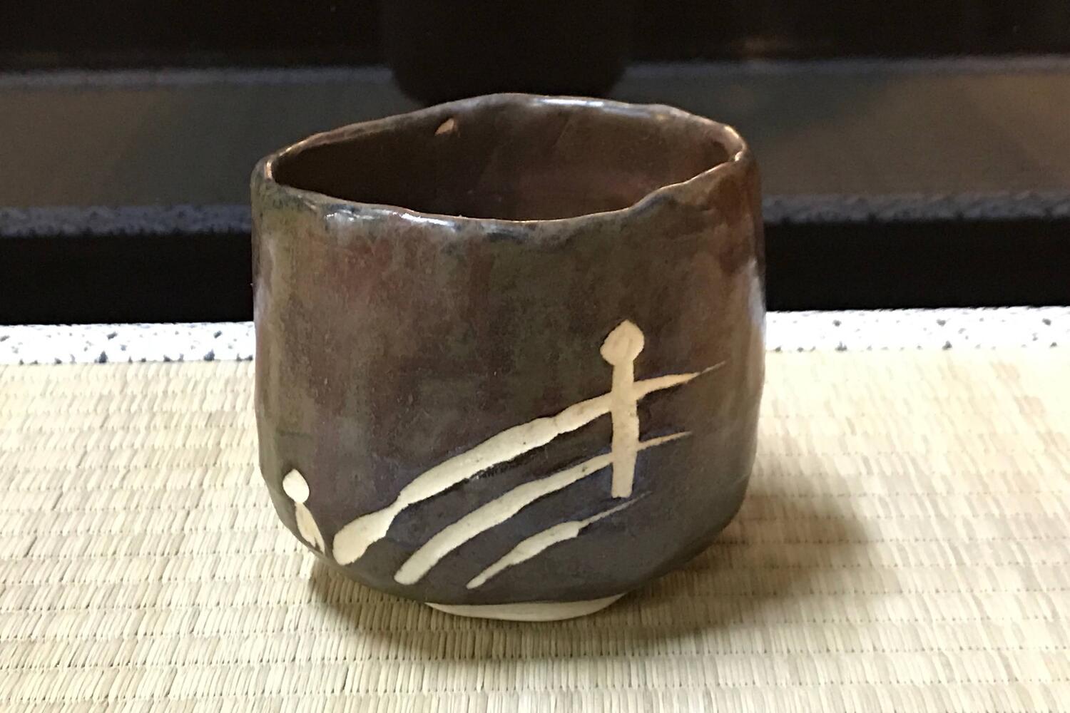 鉄釉扇子柄抹茶碗