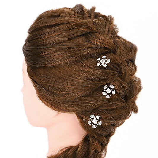●サイズ 約6.5cm　 飾り部分 直径 約2cm ●材質 金属　ラインストーン 中心のみ色付ラインストーン Uピン　3点セット ●色 シルバー ●ご利用シーン 結婚式 入学式 卒業式 入園式 卒園式 お宮参り 七五三 浴衣 パーティー 和装・洋装などのフォーマルな衣装にご利用頂けます。 黒留め 色留め 訪問着 色無地 小紋 浴衣 ドレスなどに ●商品説明 キラキラ光る煌きが美しいUピン髪飾り シンプルなので、浴衣、お着物、ドレスに合わせやすいアイテム ヘアスタイルにプラスするだけで、女性らしさを演出します アレンジしたまとめ髪のアクセントにお使いください