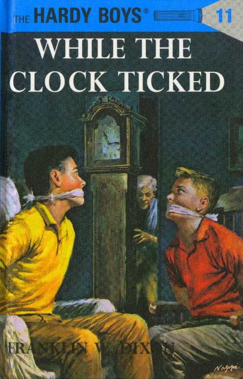  While the Clock Ticked (Hardy Boys, Book 11) - Franklin W. Dixon (Grosset & Dunlap)  9780448089119