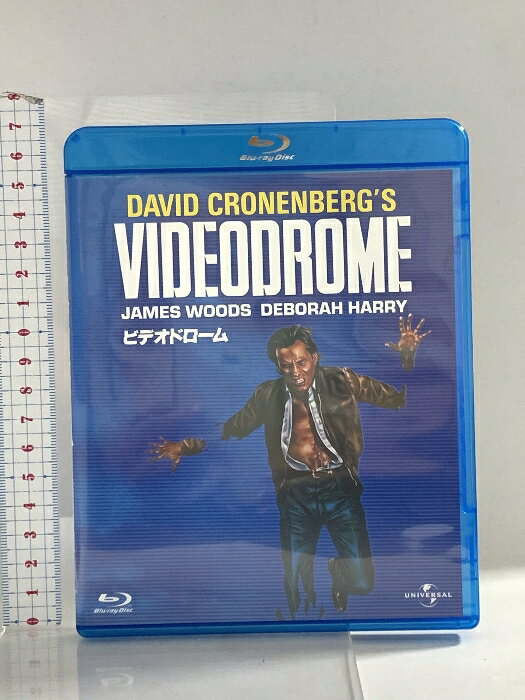 【中古】ビデオドローム ジェネオン・ユニバーサル ジェームズ・ウッズ 「Blu-ray」　SKU00K-250606014007001-000　jan　コンディション中古 - 良い　コンディション説明バーコードがありません。番号「BD-25661」の商品です。ディスク・ケースのセット販売です。その他の付属品はないもとのご理解下さい。盤面は良好です。ケースにスレ、があります。※注意事項※■付録等の付属品がある商品の場合、記載されていない物は『付属なし』とご理解下さい。 ポイント消化 にご利用ください。　送料ゆうメール　商品説明【当店の商品詳細・付属品や状態はコンディション説明でご確認ください。こちらに記載がある場合は書籍本体・内容の説明や元の付属品の説明であり、当店の商品とは異なる場合があります。参考としてご覧ください。】あの感動との再会を新たな感動との出会いをユニバーサル 100周年ユニバーサル シネマ・コレクション ブルーレイビデオテープに魅せられた男の謎―。デヴィッド・クローネンバーグ監督が放つ、異色の衝撃カルト・ホラー!「初BD化」【キャスト】ジェームズ・ウッズ/ソーニャ・スミッツ/デボラ・ハリー/ピーター・ドゥヴォルスキー【スタッフ】監督:デヴィッド・クローネンバーグ■製作:1982■Disc枚数:1■画面サイズ:16:9■収録時間:87分※映像特典、商品仕様、ジャケット写真などは予告無く変更となる場合がございます。　※※※※注意事項※※※※・配送方法は当店指定のものとなります。変更希望の場合は別途追加送料を頂戴します。・送料無料の商品については、当社指定方法のみ無料となります。・商品画像へ、表紙についているステッカーや帯等が映っている場合がありますが、中古品の為付属しない場合がございます。・写真内にある本・DVD・CDなど商品以外のメジャーやライター等のサイズ比較に使用した物、カゴやブックエンド等撮影時に使用した物は付属致しません。コンディション対応表新品未開封又は未使用ほぼ新品新品だがやや汚れがある非常に良い使用されているが非常にきれい良い使用感があるが通読に問題がない可使用感や劣化がある場合がある書き込みがある場合がある付属品欠品している場合がある難あり強い使用感や劣化がある場合がある強い書き込みがある場合がある付属品欠品している場合がある