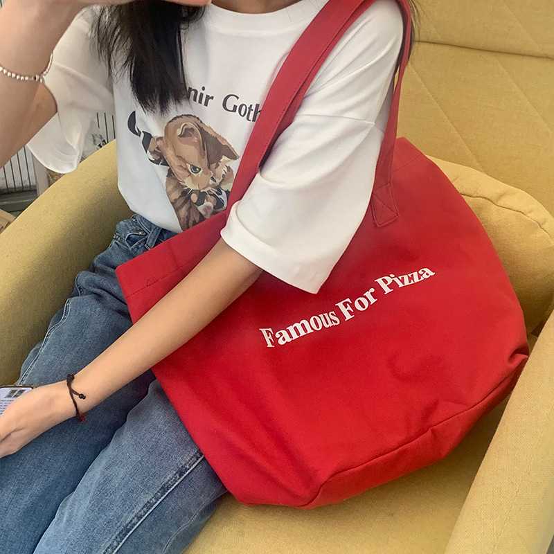 Rakuten - 赤いキャンバスバッグ大容量シングルバッグ授業バッグ通勤バッグシンプル布袋
