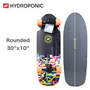 ■Hydroponic ハイドロポニック Surfskate Complete / Rounded 30インチ スケートボード 【カラー】 ・Glitch（ブラック系 モザイクマルチカラー） 【製品仕様】 デッキ：7層ハードロックカナダメープル、エポキシ樹脂 寸法：長さ30インチ x 幅10インチ ホイールベース：16,5 inches Wheelbas トラック：Surf Skate Trucks 160 mm ブッシング：82A Barrel + Cone / EXTRA SET 85A Barrel + Cone ウィール：BUDDHA WHEELS TRICKY Yeloow, Center Set, 65 x 51 mm, 83A ベアリング：HYDROPONIC ABEC 7 with Spacers 丸みを帯びたテールは、自由にスケートしたり、オーリーしたり、フラットグラウンドのトリックをしたり、通りの縁石を上ったりすることができます。どこへ行ってもスケートできる万能デッキ。 ※輸入スケートボードの特性上、デッキ面の小さなキズやプリントの剥がれ、軽微な色補正痕などがある場合がございます。 製品の使用に全く問題がないため、不良品にはあたりませんのでご了承ください。 ■注意点 ◆画面上と実物では多少色具合が変わって見える場合もあります。ご了承ください。 ◆この商品は当店実店舗でも販売しております。 在庫数の更新は随時行っておりますが、お買い上げいただいた商品が、品切れになってしまうこともございます。 その場合、お客様には必ず連絡をいたしますが、万が一入荷予定がない場合は、 キャンセルさせていただく場合もございます。 あらかじめご了承ください。