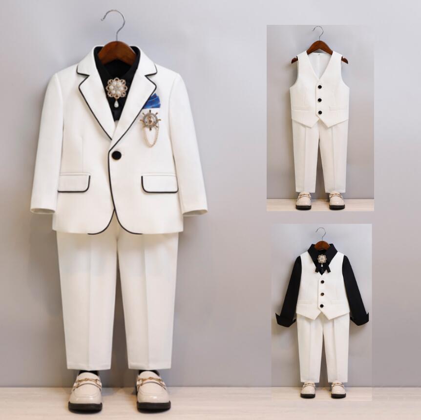 ITEM INFORMATION 【商品詳細】 3点セット：ベスト＋パンツ＋リボン 4点セット：ベスト＋パンツ＋リボン＋シャツ 6点セット：コート＋ベスト＋パンツ＋リボン＋ブローチ＋スカーフ 7点セット：コート＋ベスト＋パンツ＋リボン＋ブローチ＋スカーフ＋シャツ 至急ご利用頂く場合は事前にメールでご連絡お願いします 入学式　卒業式　コンクール　お受験　発表会　結婚式　パーティー　演奏会　多用途 ご注意：シャツの色は写真通りに組み合わせて販売することになっています、色はご指定の場合コメントください。 ■サイズ コート＋パンツ 90　着丈35　肩幅26　バスト64　ズボン丈47　ウェスト45　ヒップ64 100　着丈38　肩幅27　バスト67　ズボン丈54　ウェスト47　ヒップ67 110　着丈42　肩幅29　バスト70　ズボン丈61　ウェスト49　ヒップ71 120　着丈46　肩幅30　バスト74　ズボン丈68　ウェスト51　ヒップ75 130　着丈49　肩幅32　バスト78　ズボン丈75　ウェスト54　ヒップ79 140　着丈53　肩幅34　バスト82　ズボン丈81　ウェスト59　ヒップ83 150　着丈57　肩幅36　バスト87　ズボン丈87　ウェスト62　ヒップ88 160　着丈61　肩幅38　バスト92　ズボン丈93　ウェスト65　ヒップ93 170　着丈65　肩幅40　バスト97　ズボン丈98　ウェスト68　ヒップ98 ■色 ホワイト ■素材 ポリエステル　コットン ■注意点※ お取り扱い方法： 手洗いおすすめ致します（30℃を限度） 塩素系及び酸素系の漂白剤の使用禁止　 日陰のつり干しが良い アイロン仕上げ可 洗濯機可 注意事項： ※サイズは平置き手採寸サイズとなります。素人が図る為若干の誤差は御座いますが、ご理解の程宜しくお願い致します。 ※製造中により、商品において色や柄、縫製など多少のほつれ等が生じる場合がございます。神経質の方はご購入をお控え下さい ※モデルに使用している小物、アクセサリ等は商品内容に含まれません。在庫管理や発送上の状況により商品がシワになる場合が御座いますので、予め。 ※商品の在庫状況は更新するように努力しておりますが、在庫切れの際はご理解をいただきますようお願いいたします。 安心保障： 不良品の場合、弊社負担で交換・返品対応いたします 一週間以内サイズ・色交換可能（送料生じることがあります） お客様都合より返品受付できない場合がございます（ドレスや舞台衣装、原則として交換可能、返品不可） イメージ違いよりの返品は受付できない場合がございます ITEM INFORMATION 【商品詳細】 3点セット：ベスト＋パンツ＋リボン 4点セット：ベスト＋パンツ＋リボン＋シャツ 6点セット：コート＋ベスト＋パンツ＋リボン＋ブローチ＋スカーフ 7点セット：コート＋ベスト＋パンツ＋リボン＋ブローチ＋スカーフ＋シャツ 至急ご利用頂く場合は事前にメールでご連絡お願いします 入学式　卒業式　コンクール　お受験　発表会　結婚式　パーティー　演奏会　多用途 ご注意：シャツの色は写真通りに組み合わせて販売することになっています、色はご指定の場合コメントください。 ■サイズ コート＋パンツ 90　着丈35　肩幅26　バスト64　ズボン丈47　ウェスト45　ヒップ64 100　着丈38　肩幅27　バスト67　ズボン丈54　ウェスト47　ヒップ67 110　着丈42　肩幅29　バスト70　ズボン丈61　ウェスト49　ヒップ71 120　着丈46　肩幅30　バスト74　ズボン丈68　ウェスト51　ヒップ75 130　着丈49　肩幅32　バスト78　ズボン丈75　ウェスト54　ヒップ79 140　着丈53　肩幅34　バスト82　ズボン丈81　ウェスト59　ヒップ83 150　着丈57　肩幅36　バスト87　ズボン丈87　ウェスト62　ヒップ88 160　着丈61　肩幅38　バスト92　ズボン丈93　ウェスト65　ヒップ93 170　着丈65　肩幅40　バスト97　ズボン丈98　ウェスト68　ヒップ98 ■色 ホワイト ■素材 ポリエステル　コットン ■注意点※ お取り扱い方法： 手洗いおすすめ致します（30℃を限度） 塩素系及び酸素系の漂白剤の使用禁止　 日陰のつり干しが良い アイロン仕上げ可 洗濯機可 注意事項： ※サイズは平置き手採寸サイズとなります。素人が図る為若干の誤差は御座いますが、ご理解の程宜しくお願い致します。 ※製造中により、商品において色や柄、縫製など多少のほつれ等が生じる場合がございます。神経質の方はご購入をお控え下さい ※モデルに使用している小物、アクセサリ等は商品内容に含まれません。在庫管理や発送上の状況により商品がシワになる場合が御座いますので、予め。 ※商品の在庫状況は更新するように努力しておりますが、在庫切れの際はご理解をいただきますようお願いいたします。 安心保障： メーカー希望小売価格はメーカーカタログに基づいて掲載しています