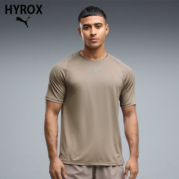 【商品名】 PUMA x HYROX PWRMODE 半袖 Tシャツ 【品番】 529237 【カラー】 (81)Mouse Gray 【サイズ】 S~XXL S: 胸囲:92cm ゆき:45cm 後ろ丈:72cm すそ周り:94cm M: 胸囲:100cm ゆき:45cm 後ろ丈:72.5cm すそ周り:103cm L: 胸囲:106cm ゆき:47cm 後ろ丈:73.5cm すそ周り:110cm XL: 胸囲:119cm ゆき:48cm 後ろ丈:76cm すそ周り:120cm 【素材】 本体:ポリエステル92%ポリウレタン8% 【注意】 他の通販サイトと在庫共有しているため、ごくまれにご注文後でも在庫切れの場合がございます。 その際は連絡させて頂きますので、予めご了承ください。 また、実際の商品と比較し色味に若干の誤差が生じる場合がございますので、ご了承下さい。 【製造販売元】 プーマジャパン株式会社 メーカー希望小売価格はメーカーサイトに基づいて掲載していますPUMA x HYROXのTシャツは、高強度トレーニングからリカバリーまで幅広いシーンに対応する高機能ウェアです。 インターバルトレーニングやワークアウトなどアクティブな動きを想定した設計で、動きやすさと快適な着用感を両立し、トレーニング中のパフォーマンスをサポートします。通気性を高める穴あき加工とラグランスリーブにより、腕まわりの可動域を確保しながらムレを軽減。さらに、DRYELITEテクノロジーを採用し、速乾性と吸汗性に優れた素材が汗を素早く処理することで、ハードなトレーニング中でもドライで快適な状態をキープします。軽量で使いやすく、トレーニングからクールダウンまで一貫して活躍する一着です。 この商品はインポートサイズです。各サイズの詳細は「サイズガイド」をご確認ください。 PUMA x HYROXコレクション 本コレクションは、HYROX競技の特性に合わせて設計されたシューズを中心に、高強度なレース環境に対応するアパレルやアクセサリーまで、競技者のパフォーマンスを支えるギアをラインアップ。競技者一人ひとりのパフォーマンスを多角的にサポートします。 【HYROXについて】 HYROXは世界中で開催されている国際的なフィットネスレースで1kmのランニングと1つのファンクショナル・ムーブメントからなる8ラウンドで構成され、単なるフィットネスレースにとどまらず、ライフスタイルの一部として多くの人々に愛されています。 ■特徴 リサイクル素材使用：より良い未来への一歩として、90％以上のリサイクル素材を使用 ■詳細 ・用途：トレーニング ・フィット感：レギュラー ・丈：レギュラー ・襟：クルーネック ・主な素材：シングルジャージ ・通気性を高める穴空き加工 ・半袖 ・動きやすいラグランスリーブ ・背中の首元にハンガーループ ・DRYELITEテクノロジーにより、速乾性と吸湿速乾性に優れた素材が、激しいトレーニング中でもドライな状態を保ちます。