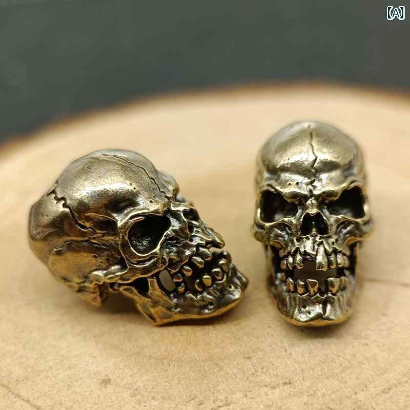 キーホルダー　アクセサリー　メタル スカル シリーズ ナイフ ペンダント EDC レトロ 真鍮 傘 ロープ ..