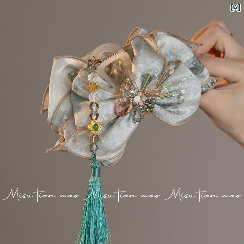 アクセサリー　ピン　ヘア クリップ 女性 2025 ハイエンド 象徴 ヘア クリップ後 頭部の 弓 頭飾り チャイナ風 タッセル サメ クリップを つかむ
