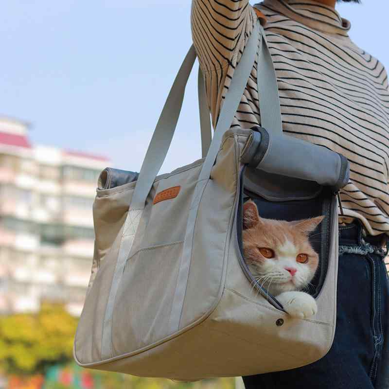 ペットキャリー バッグ 猫用 犬用 鞄 抱っこ紐 外出用 トートバッグ 帆布 大容量 ペット用品 散歩 通院 旅行 通気性 快適 軽量 耐久性 丈夫 手提げ ショルダー 肩掛け お出かけ用 室内外兼用 快適な居心地 安定感 持ち運び便利 調整可能 災害避