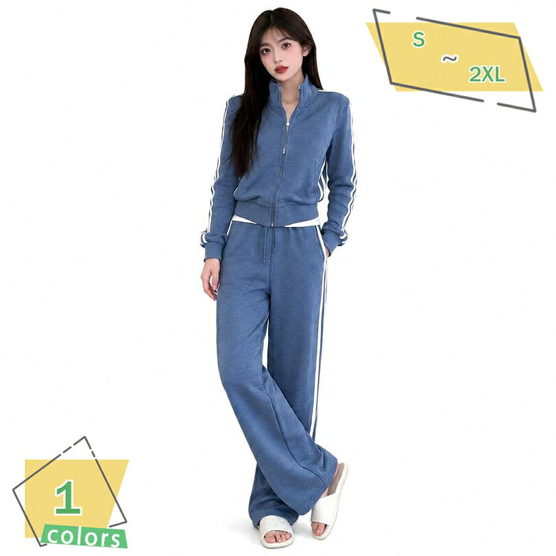 表地：綿、ポリエステルメイン素材：綿、ポリエステル【スウェット上下】さらっとした肌触りが心地よいスウェット上下セットアップです。スタンドカラーのジップアップジャケットと動きやすいワイドパンツの組み合わせで、デイリーの部屋着やワンマイルウェアとして活躍します。すっきりとしたシルエットで体型カバー効果も期待でき、快適な着心地を提供します。【セットアップ レディース】カジュアルでおしゃれなセットアップは、春や秋の肌寒い季節のお出かけにぴったりです。カラーは爽やかなブルーをご用意しており、サイズもS、M、L、XL、XXLと豊富に展開しています。ゆったりとした着用感で、リラックスタイムのルームウェアとしてもです。【ルームウェア】お家でのリラックスタイムから、ちょっとした外出まで幅広く使えるルームウェアです。フードなしのすっきりとした首元はスタンドカラーデザインで、大人カジュアルな印象を与えてくれます。やわらかなスウェット生地を使用しており、しっとりとしたソフトな手触りが特徴です。【ジャージ 上下セット】アクティブな日常になジャージ上下セットです。スポーティーな雰囲気ながらも、きれいめなデザインで野暮ったくならず、上品な大人コーデに仕上がります。通気性が良く軽やかな着心地で、ウォーキングやヨガなどの軽いスポーツウェアとしても便利にご着用いただけます。【大きいサイズ】ゆったりとした設計で、ぽっちゃり体型の方にもの大きいサイズ展開のカジュアルウェアです。ジャケットとパンツのバランスが良く、着用するだけでスタイルアップを叶えてくれます。通学やデイリーの普段着、旅行時の移動着など、様々なシーンでコーディネートを楽しめます。【大人のカジュアルスタイルを叶えるスウェット上下セットアップ】デイリーユースからアクティブなシーンまで幅広く活躍する、セットアップが登場しました。ジップアップ仕様のジャケットと、程よいワイドシルエットのパンツがセットになっており、これ一つでコーディネートが完成します。余計な装飾を省いたシンプルなデザインながら、スタンドカラーが首元をすっきりと見せ、上品で落ち着いた大人カジュアルな雰囲気を演出します。【さらっと心地よい着用感と体型カバー効果】素材には、しっとりやわらかで肌触りの良い綿混スウェット生地を採用。さらさらとした質感が肌に心地よく、通気性にも優れているため、春や秋の季節の変わり目に快適に着用いただけます。ゆったりとしたサイズ感とシルエットにより、気になる体型を自然にカバーしつつ、着用時の縦のラインを強調してすっきり見せを叶えます。【多彩なシーンで活躍するアイテム】お部屋でのリラックスタイムを過ごすルームウェアやパジャマとしてはもちろん、ちょっとしたお出かけのワンマイルウェア、通学や旅行の移動着、ジョギングやヨガなどの軽めのスポーツウェアとしてもです。ジャケット単体で手持ちのボトムスと合わせたり、パンツ単体でお好みのTシャツやパーカーと合わせるなど、セパレートでの着回し力もです。【選べるサイズ展開と爽やかなカラー】爽やかで落ち着いた印象を与えるブルーのカラーリングが、お顔回りを明るく見せてくれます。サイズはSサイズから、ゆったり着用できるXXLサイズまで豊富にご用意。ご自身のスタイルや好みの着用感に合わせてお選びいただけます。リラックス感とおしゃれさを両立させた一着を、ぜひ毎日のワードローブに加えてみてください。以下の用語は検索目的のためのものであり、製品の説明はありません。レディース セットアップ スウェット上下 ジャージ上下 長袖 ロングスリーブ ロング丈 パンツ 部屋着 外出 ストライプ柄 配色 切り替え カジュアル 上下 セット フード無しルームウェア レディース 上下 セット スウェット上下 長袖 フルレングスパンツ スポーティー 通学 お出かけ ワンマイルウェア 楽ちん さらさら 柔らかい ブルー S M Lスウェット上下 レディース セットアップ 長袖 ロングパンツ ジャージ 上下セット ルームウェア 部屋着 春 秋 スポーツウェア カジュアル ジップアップ フードなし 青ジャージ レディース 上下セット スウェット セットアップ 運動着 ランニングウェア ジップアップ スタンドカラー サイドライン バイカラー ゆったり ぽっちゃり 春物 秋物