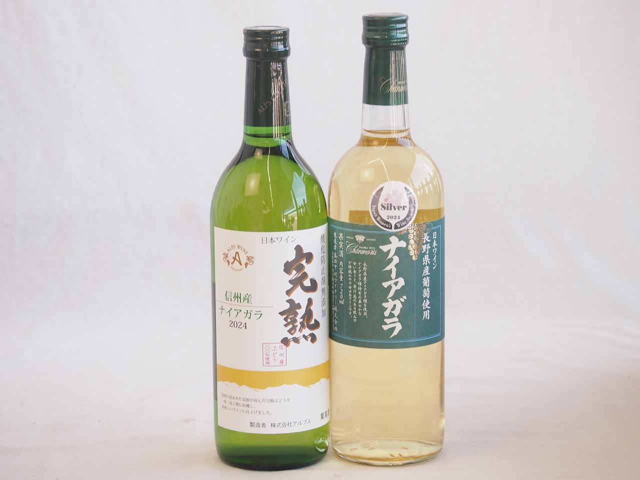 ブドウをそのままワインにしたような華やかな香りとジューシーな飲み心地のナイアガラワイン。そのフルーティーで甘い味わいにあります。口に含むと、マスカットのような豊かな香りと、桃やアプリコットを思わせる甘い果実味が広がります。この甘さは葡萄が十分に完熟していることが要因となっており、糖度が高いことで知られています。また、適度な酸味とのバランスが取れており、甘ったるさがなく、爽やかな飲み口が特徴です。冷やして飲むことでさらにフルーティーさが引き立ち、夏場にぴったりのワインです。ナイアガラ葡萄フルーティーでフレッシュな風味ワイン2本セット(信州産完熟ナイアガラ 長野県産葡萄ナイアガラ) 720ml×2本