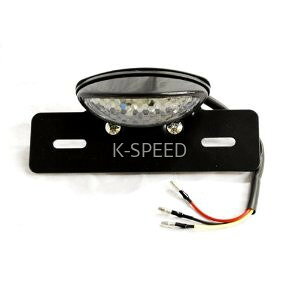 【予約販売商品】K-SPEED LEDテールランプ ナンバープレートホルダー付き バイク カスタムパーツ 汎用型番対応 K-SPEEDタイ発の人気ブランド！バイクカスタムに最適なOval LEDテールランプ（ナンバープレートホルダー付）は予約販売で12〜14日でお届けします。 商品情報【商品説明】タイ発の人気カスタムパーツブランドK-SPEEDが手掛ける、スタイリッシュなオーバル型LEDテールランプです。ナンバープレートホルダーが一体となっており、バイクのリア周りをスッキリと洗練された印象にカスタムできます。汎用型番対応のため、幅広い車種のドレスアップに最適なK-SPEEDの高品質パーツです。【カラー】商品画像参照【適合】汎用（※取り付けには加工が必要となる場合があります）【特徴】・視認性に優れたLEDを採用し、安全性とデザイン性を両立・ナンバープレートホルダー一体型でリアフェンダー周りをコンパクトに演出・K-SPEEDならではの洗練されたカスタムパーツで愛車を個性的にカスタマイズ・汎用設計により、幅広い車種へ取り付け可能・耐久性の高い素材を使用し、愛車のカスタマイズをしっかりサポート【メーカー】K-SPEED（Kスピード）タイ発の人気バイクカスタムパーツブランド。GB350・Rebel・Monkey125など人気車種のカスタムパーツを豊富に展開。【ご注意】・予約販売のためご注文後12〜14日でのお届けとなります・海外製品のため商品・箱に多少の傷・凹みがある場合があります・取り付けは自己責任でお願いします※販売元の都合により、ご注文後にキャンセルとなる場合がございます。 5