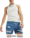 GC\X ASOS DESIGN short length denim shorts with rips in mid wash blue Y