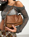 エイソス バッグ エイソス ASOS DESIGN washed shoulder bag with eyelet strap in tan レディース