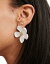 True Decadence pearlescent flower stud earrings in white ǥ