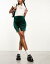 Monki velvet mini skirt with split hem in dark green ǥ