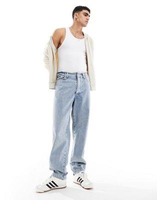 エイソス ASOS DESIGN baggy jeans with raw waistband in light wash blue メンズ