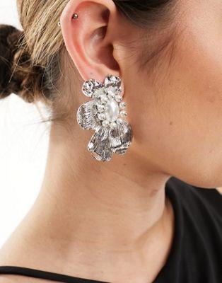 エイソス ASOS DESIGN stud earrings with textured floral and pearl design in silver tone レディース