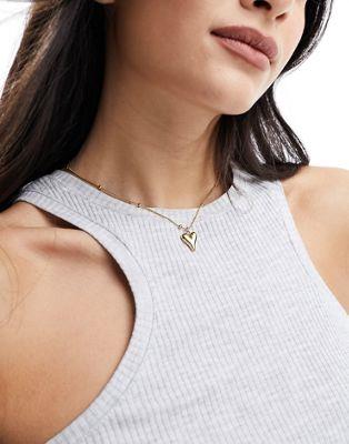 GC\X ASOS DESIGN waterproof stainless steel necklace with puff heart pendant and dot dash chain in gold tone fB[X