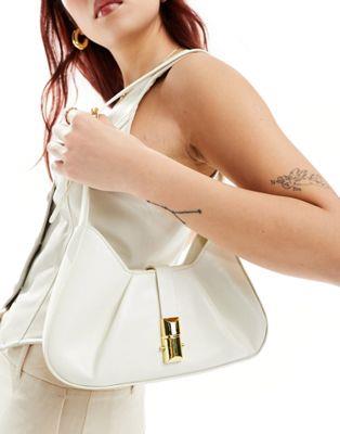 O}X Glamorous shoulder bag with gold clasp in cream fB[X